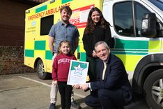 EEAST CEO Neill Moloney presents a bravery award to Esmai Boyce, with West Suffolk operations manager Liam Walker and call handler Hollie Kett