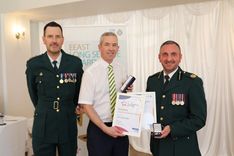 EEAST Chief Operating Officer Darren Meads and CEO Neill Moloney present a long service award to Marc Stanbridge, Head of Clinical Operations for Bedfordshire and Luton