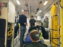 Andrew Lewin MP with Daisy and Jake in an ambulance
