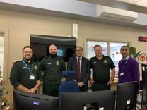 Mohammed Yasin MP with call handlers and EEAST Chair Mrunal Sisodia OBE