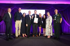 EEAST CEO Neill Moloney (left) and Medical Director Dr Simon Walsh (right) present the clinical team of the year award to Richard Smith (Centre) and the CAS team.