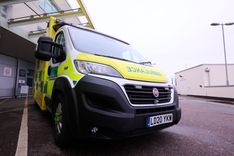 A Fiat ambulance outside an emergency department entrance
