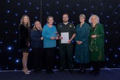 Mental health joint response team collect their award from HPFT's CEO and chair