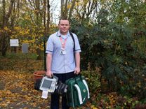 Paramedic Scott O'Rourke preparing for a home visit on behalf of St Helena's Hospice.