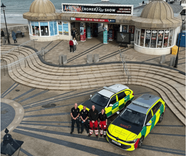 Four NARS volunteers standing on Cromer Pier