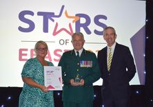 Terry Hicks is presented his Chief Executive award by CEO Neill Moloney and Marika Stephenson