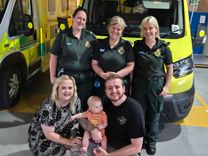 Paramedic Sarah-Jayne Parsons, Senior Emergency Medical Technician Bethany Walesby, and Emergency Care Assistant Amy Rengert with Christian and Jessica Roberts and baby Luca.