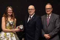 Caspar Headland receiving his Community Service Medal from Epping Forest District Council chairman Louise Mead and local MP Dr Neil Hudson
